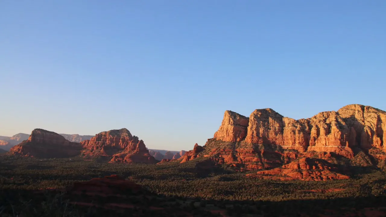 Sunset over Sedona's red-rock landscape